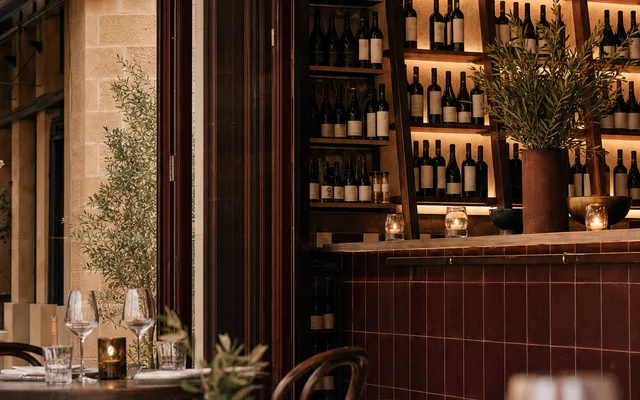 Illustrative wine-bar scene for Leigh Street Wine Room — not an actual photo of the venue