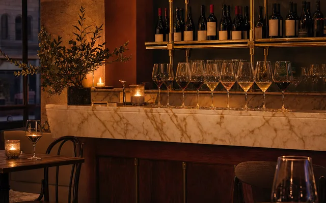 Illustrative wine-bar scene for Ogee — not an actual photo of the venue